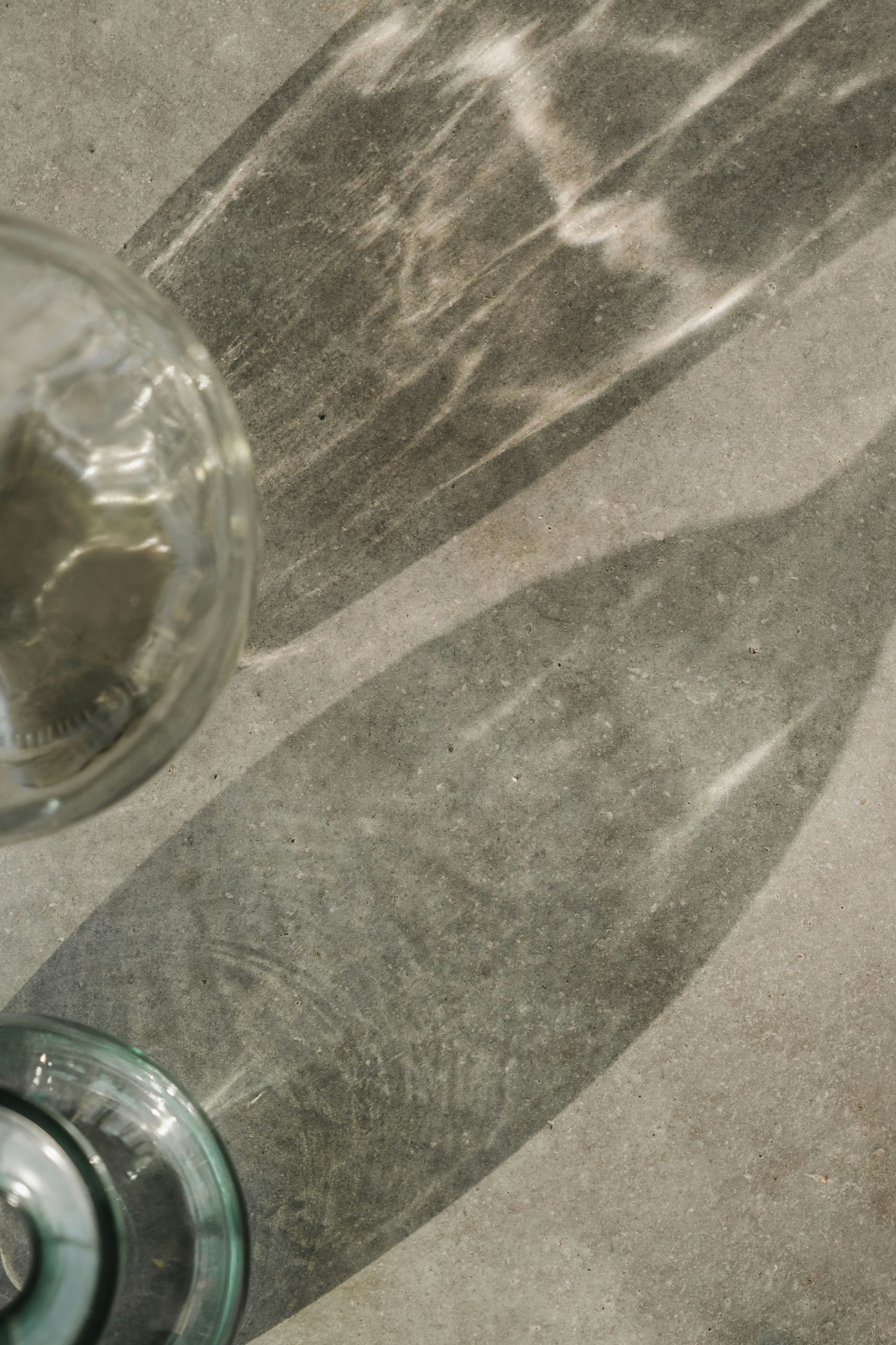Sunlight passing through clear glass vessel.