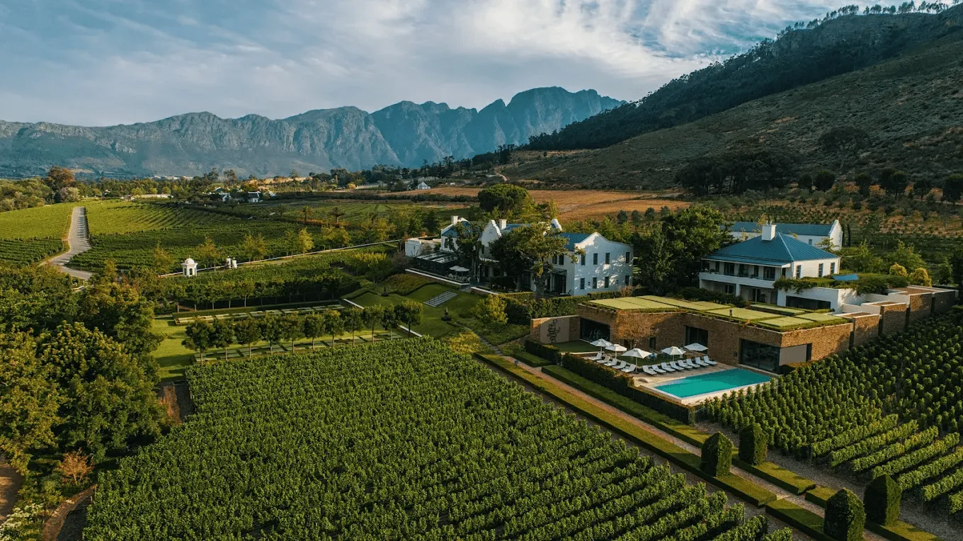 Aerial view of Leeu Estates in Franschhoek, and the dramatic backdrop of the Dassenberg mountains.