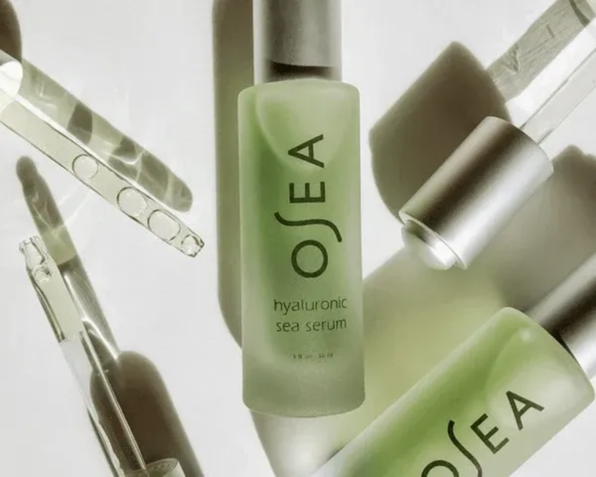 OSEA Hyaluronic Sea Serum in frosted glass bottle with droppers, featuring clean skincare branding.