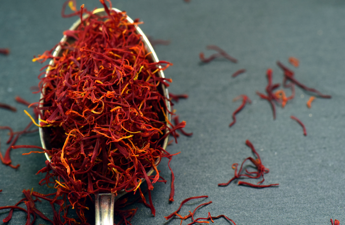 Close-up of vivid red and orange saffron threads.