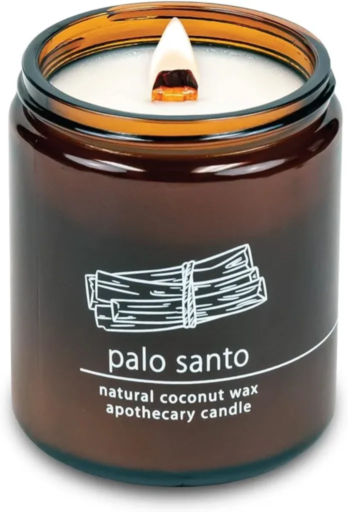 Hemlock Park Palo Santo coconut-wax apothecary candle in amber jar with crackling wooden wick for clean-burning aromatherapy.