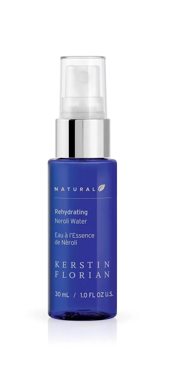 Kerstin Florian Rehydrating Neroli Water, cobalt-blue 30 mL facial mist bottle with silver spray pump.
