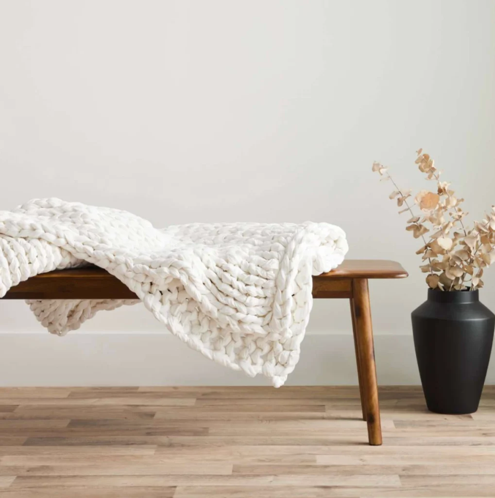 Silk & Snow hand knitted weighted blanket in cream cotton with chunky weave