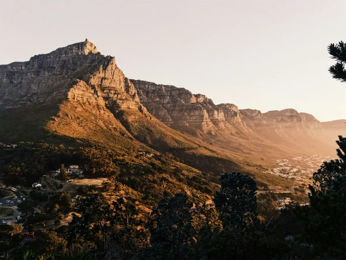 Golden hour lighting on the Twelve Apostles mountain range in Cape Town.