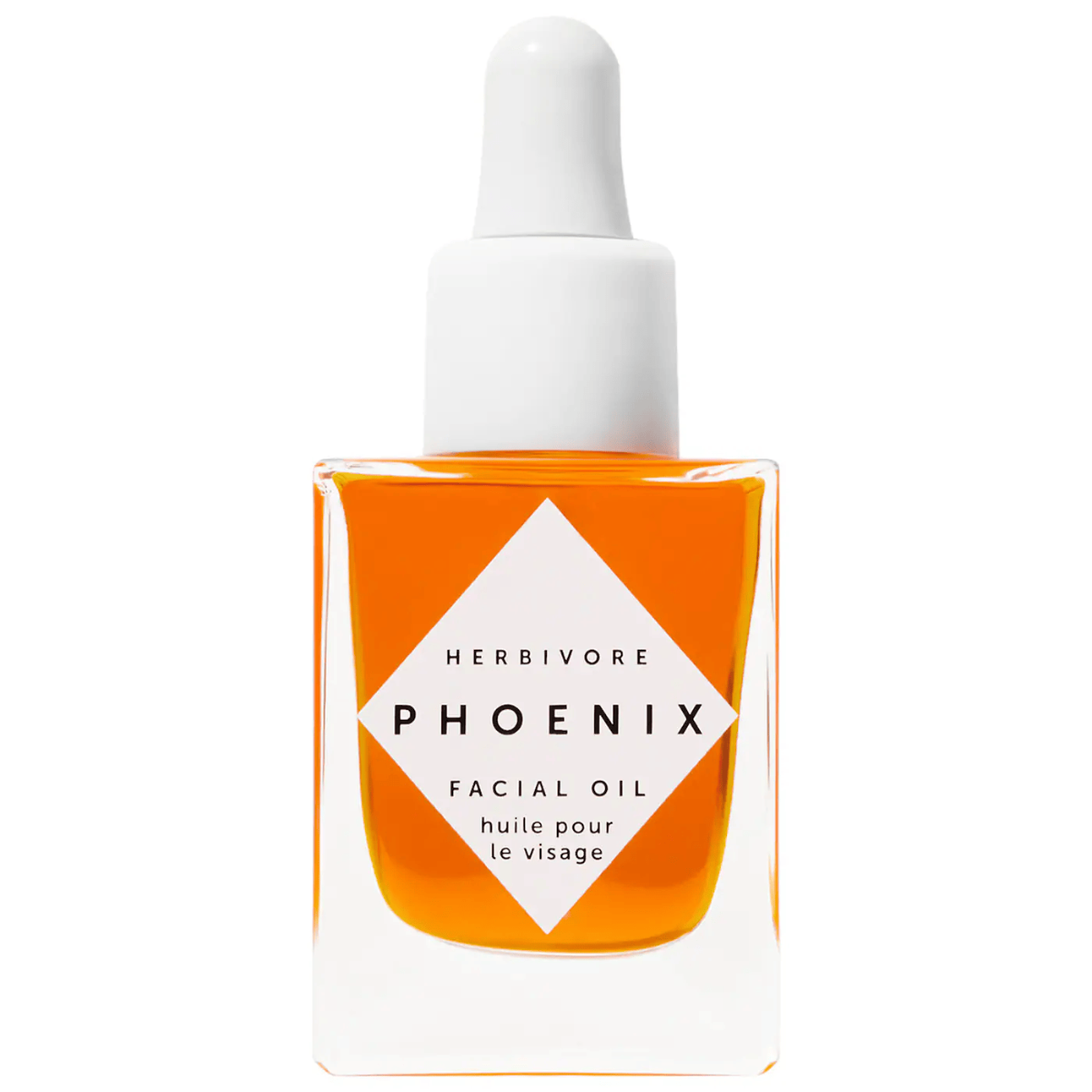 Herbivore Phoenix facial oil bottle with vibrant orange hue on neutral background.