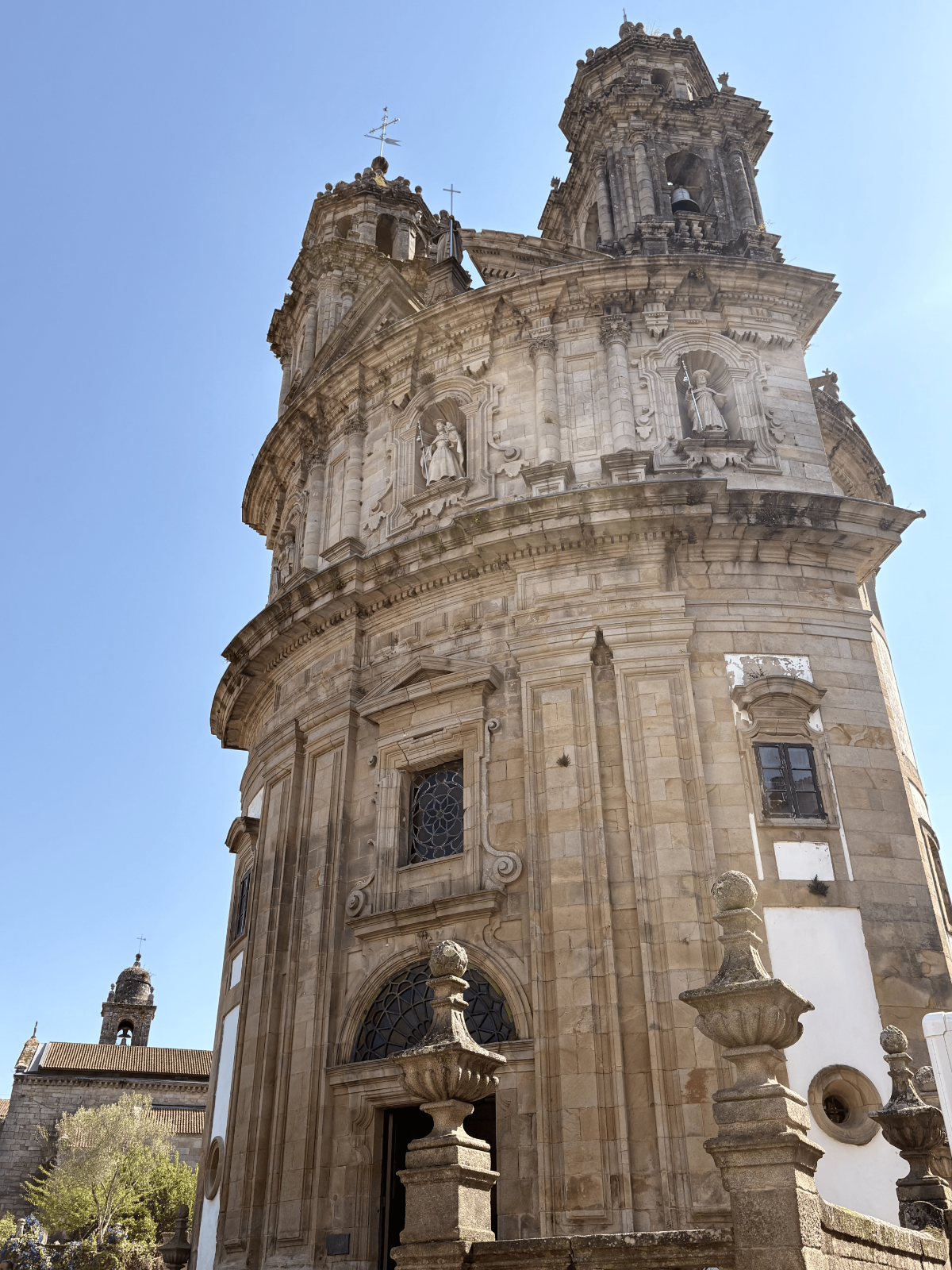 Angled view of the scallop-shaped Iglesia de la Virgen Peregrina in Pontevedra, Spain.