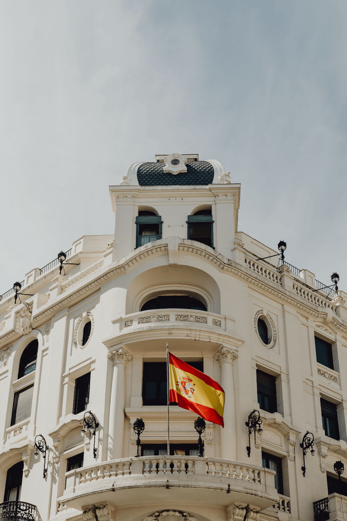 Elegant white neoclassical building on Madrid’s Gran Vía.