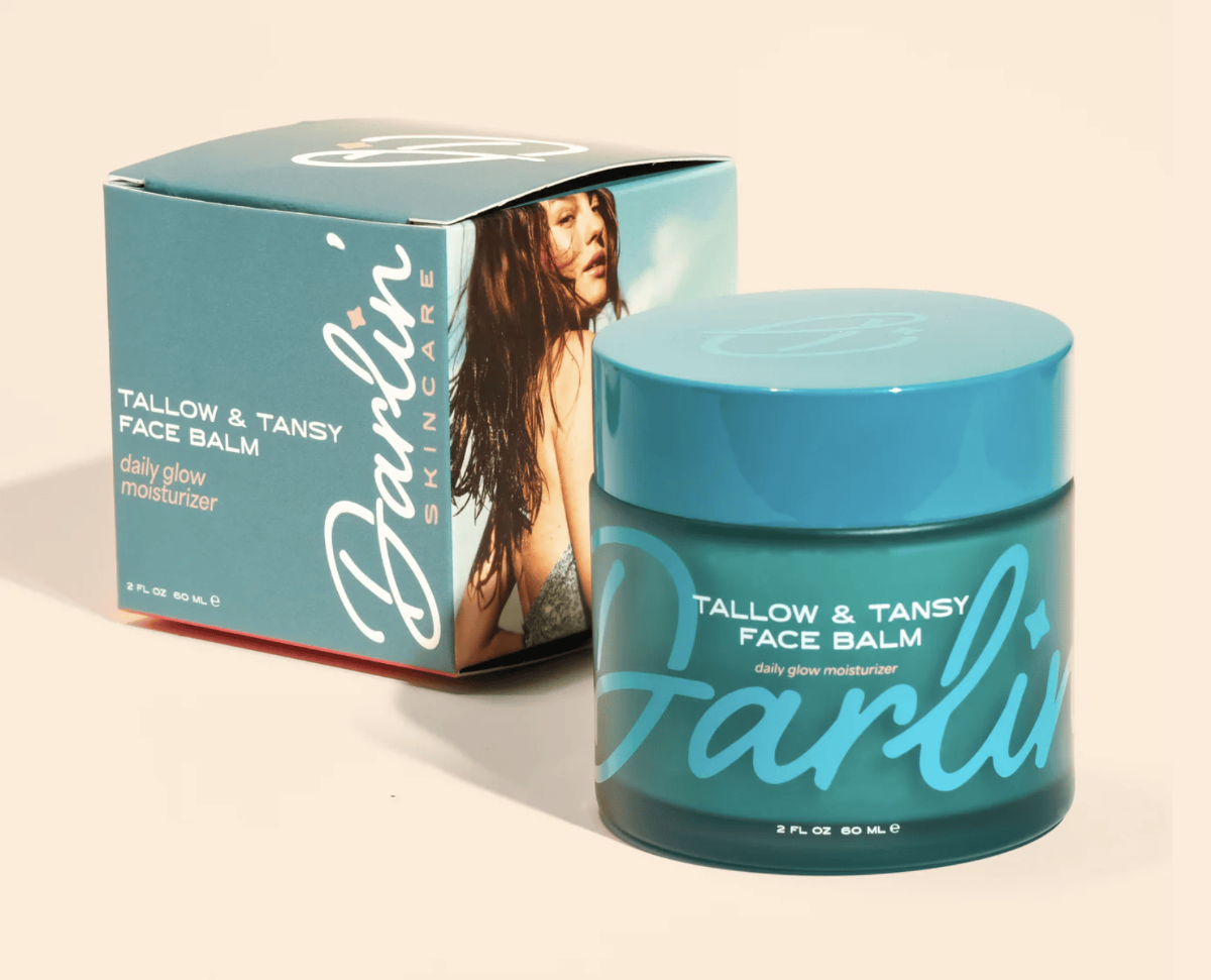 Darlin’ Skincare Tallow & Tansy Face Balm and retail box; bright teal jar for daily glow moisturizing.