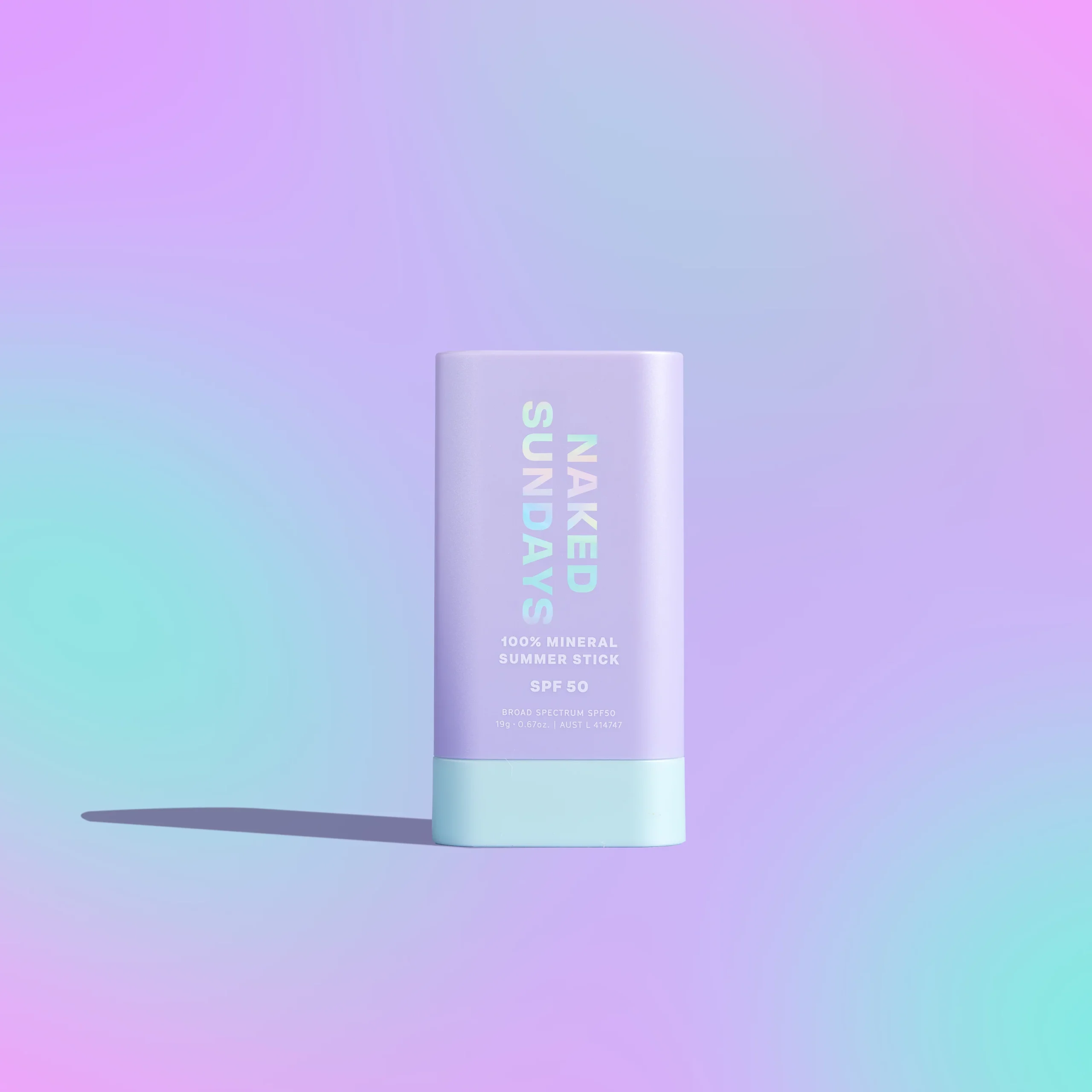 Pastel gradient backdrop with Naked Sundays Mineral Summer Stick SPF 50.