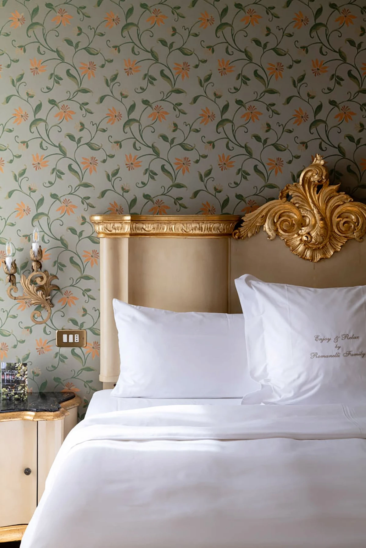 Classic room at Hotel Flora Venice with floral wallpaper and gilded Venetian headboard