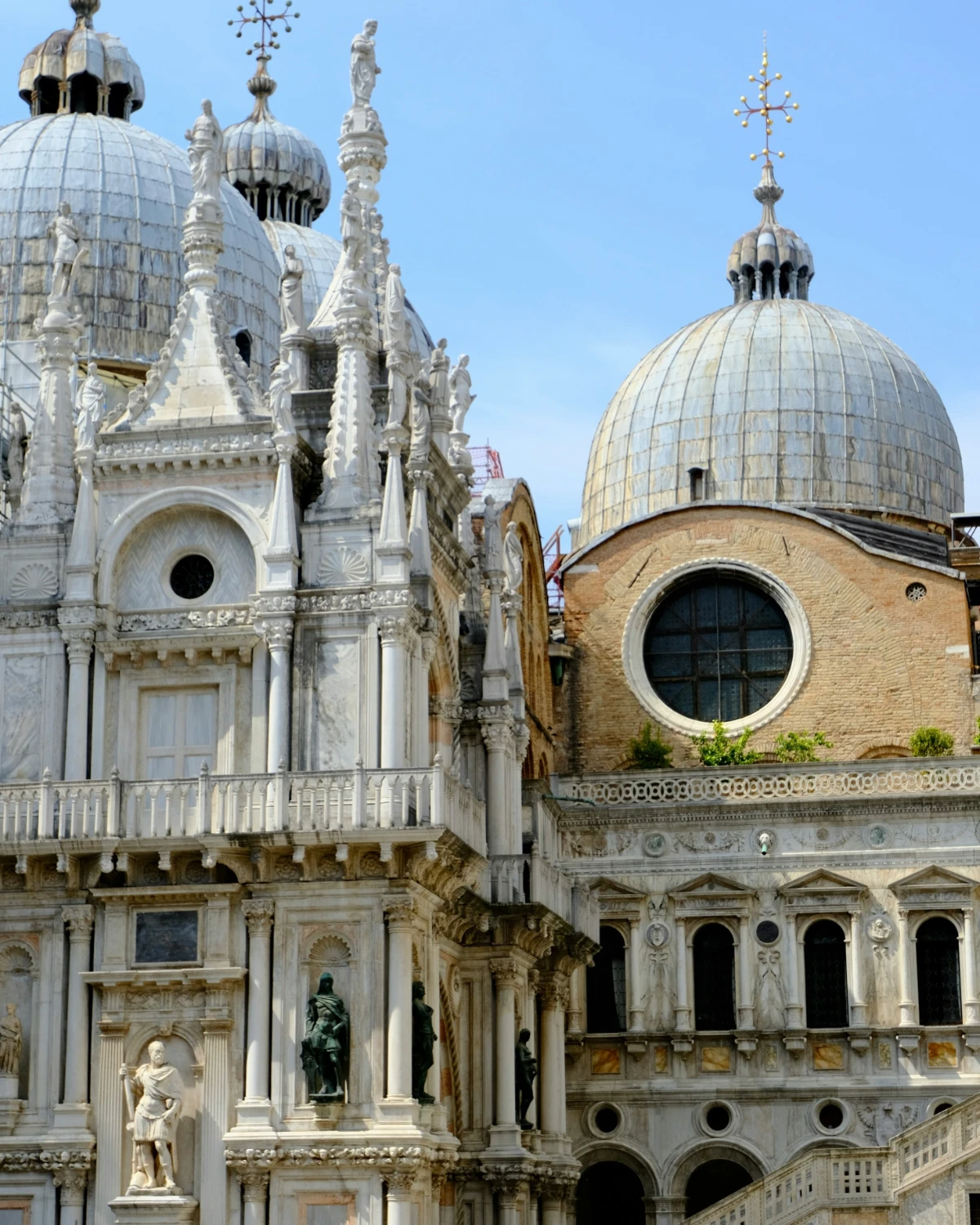 Close view of the domes and marble façade of St Mark’s Basilica in Venice