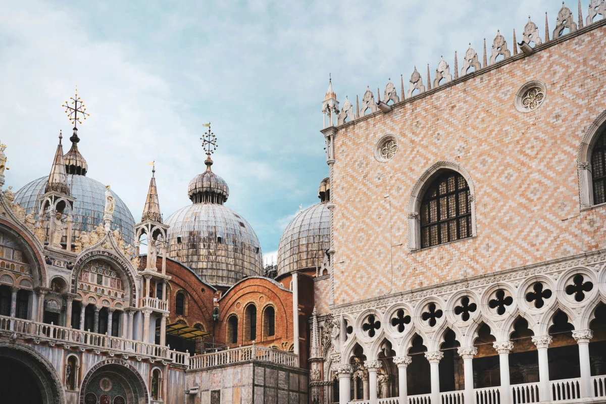 Historic domes and Gothic architecture surrounding St Mark’s Basilica in Venice