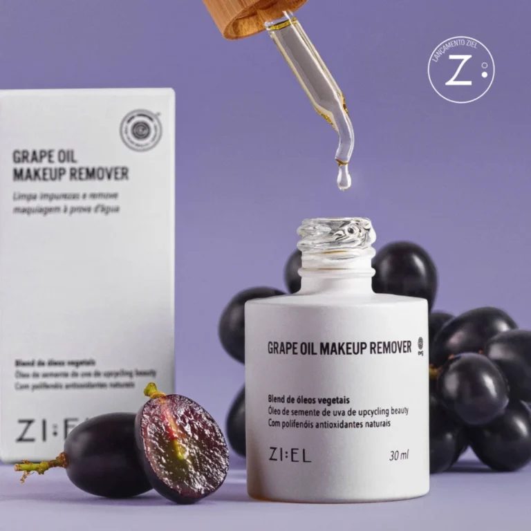 Ziel grape oil makeup remover with dropper and fresh grapes on lavender background