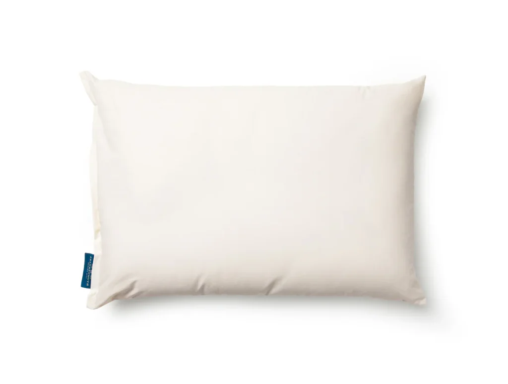 Two Frankenmuth Woolen Mill pillows are stacked at an angle against a plain white backdrop.