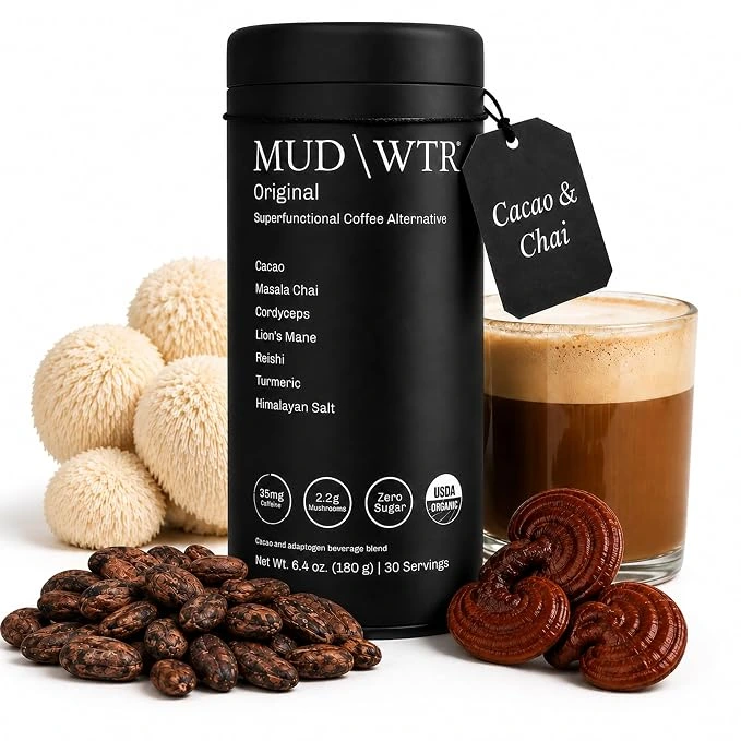 MUD\WTR Original coffee alternative with cacao beans, lion's mane, reishi and a glass of cacao chai latte.