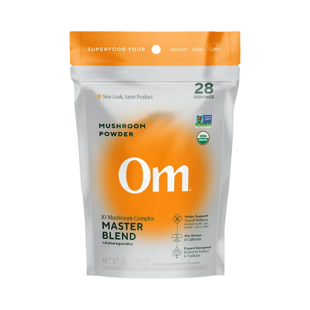 Om Mushroom Master Blend powder, a 10-mushroom complex with ashwagandha in a 28-serving pouch.